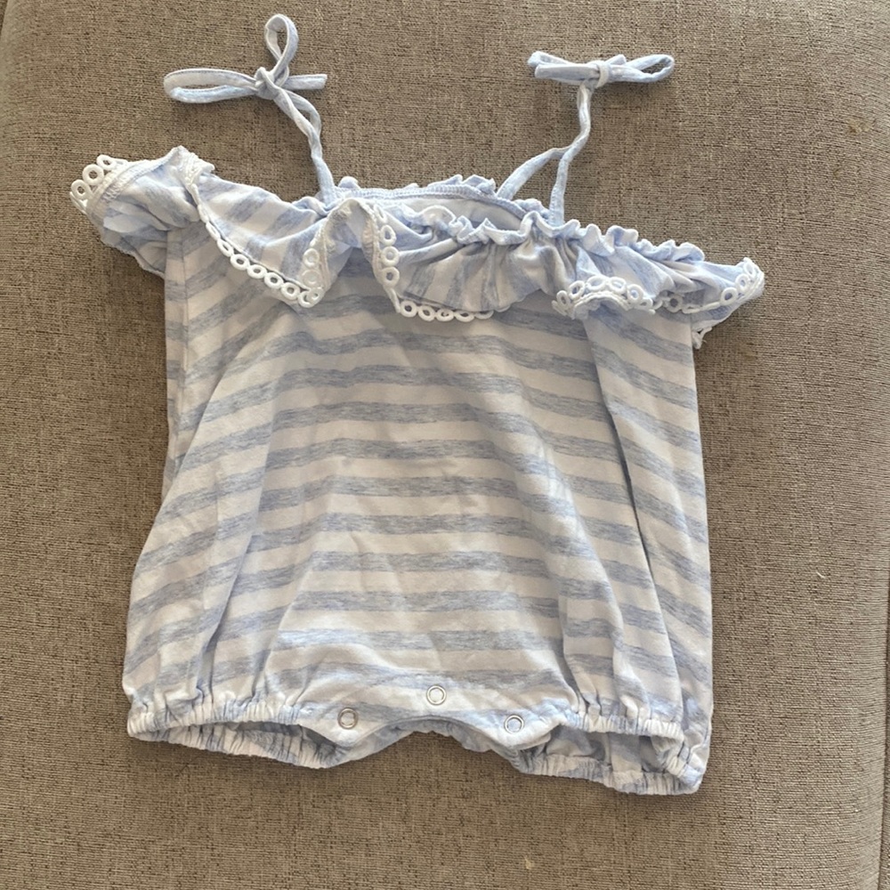 Great quality romper with ruffles on the top